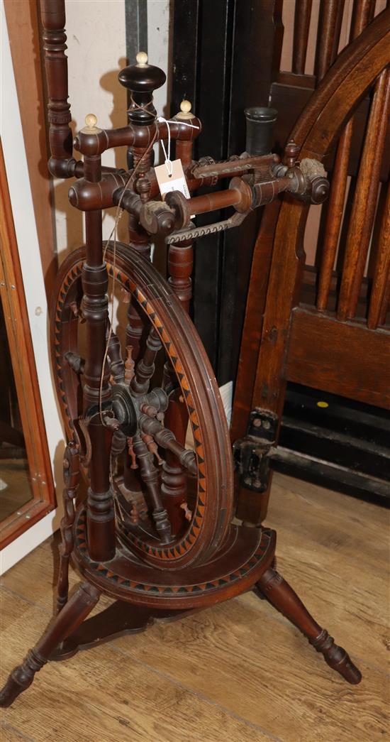 A Swiss inlaid spinning wheel W.52cm